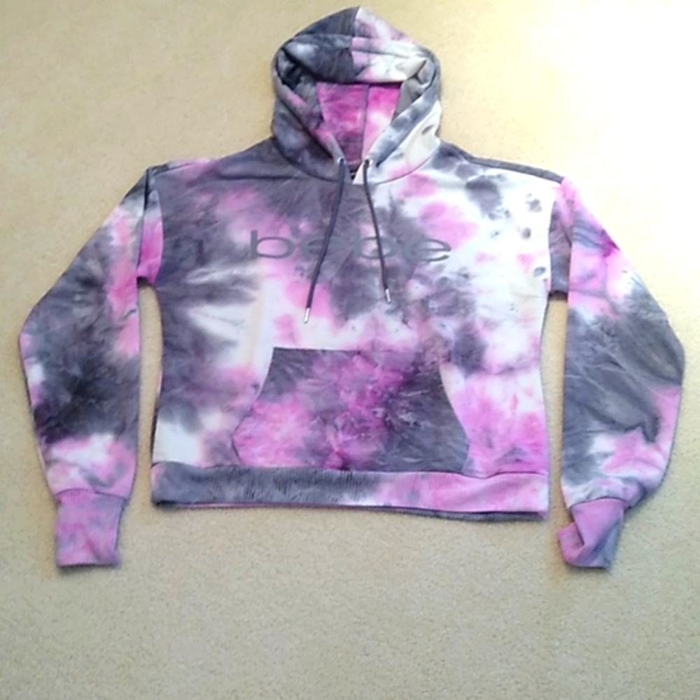 Bebe, pullover hoodie in pink and gray Tie-Dye pattern in like new condition.
